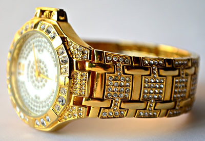 Gold watch with diamond bezel and gold band